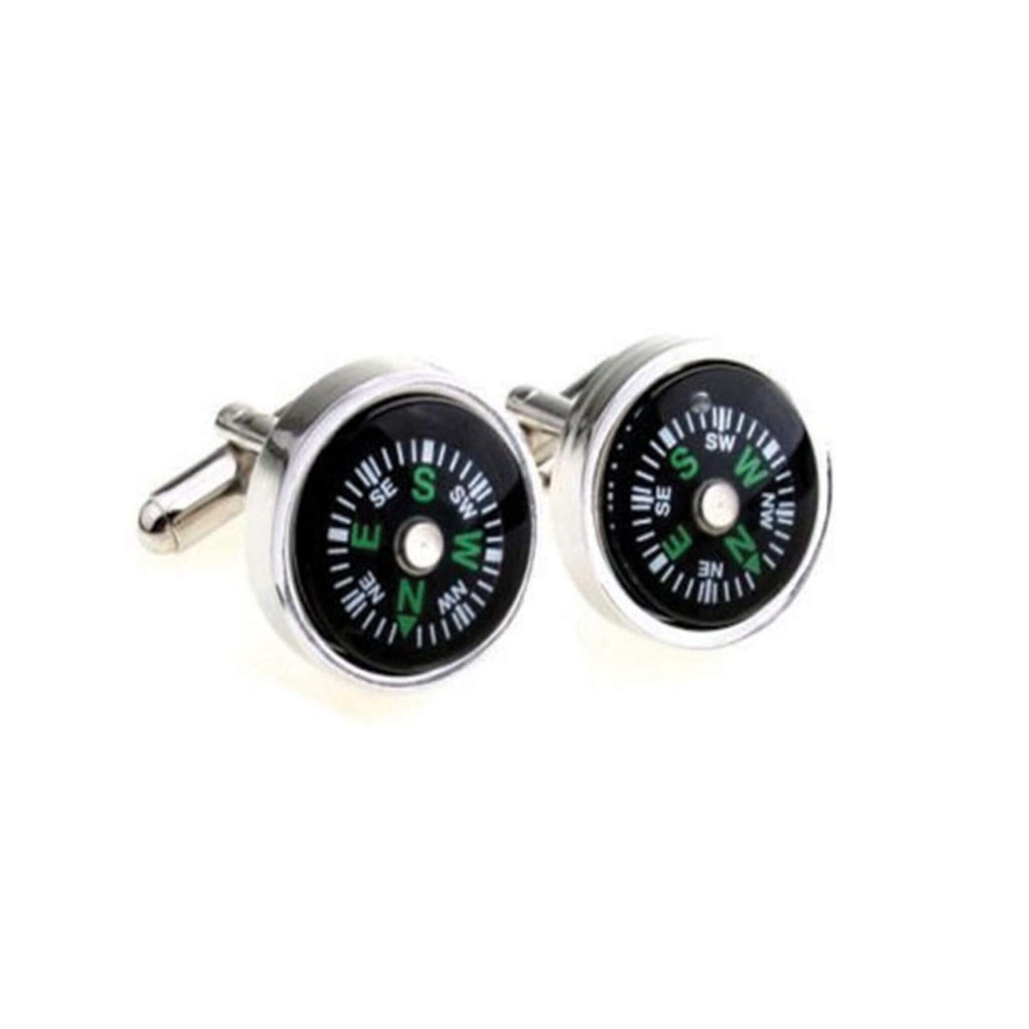 Silver compass cufflinks with black and green directional dials on white background
