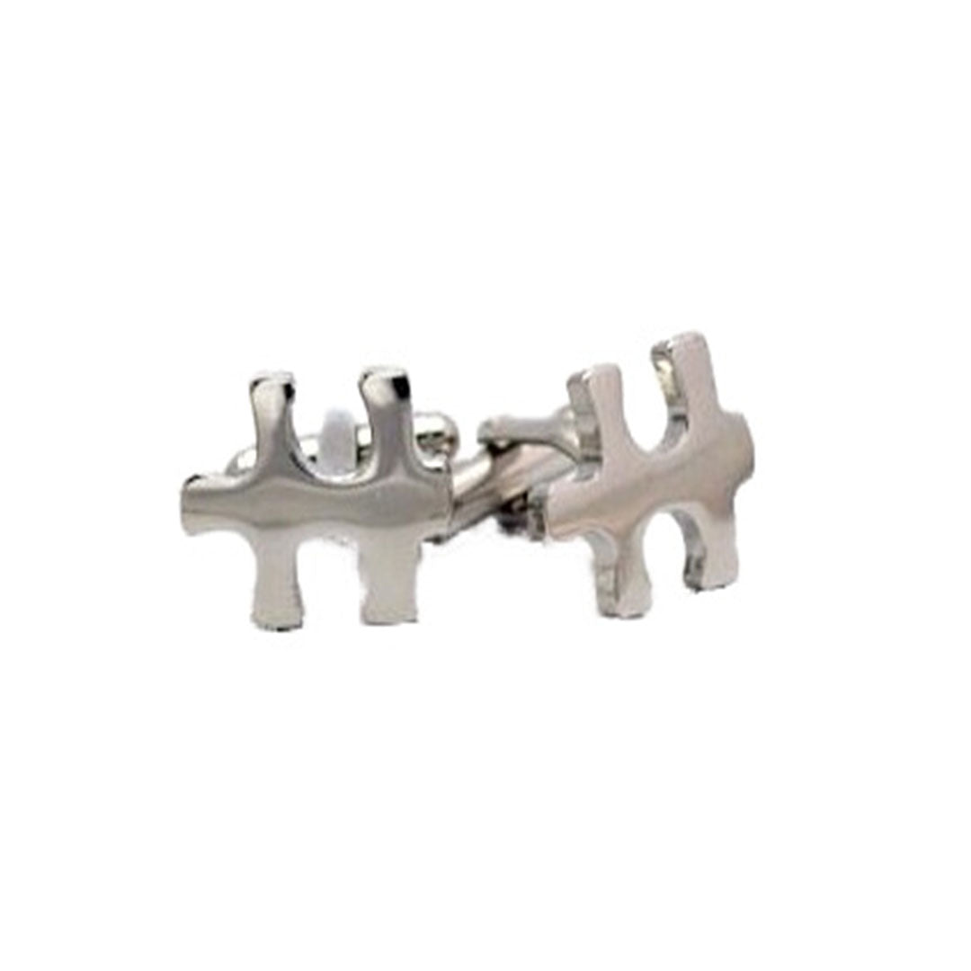 Silver jigsaw cufflinks shaped like puzzle pieces