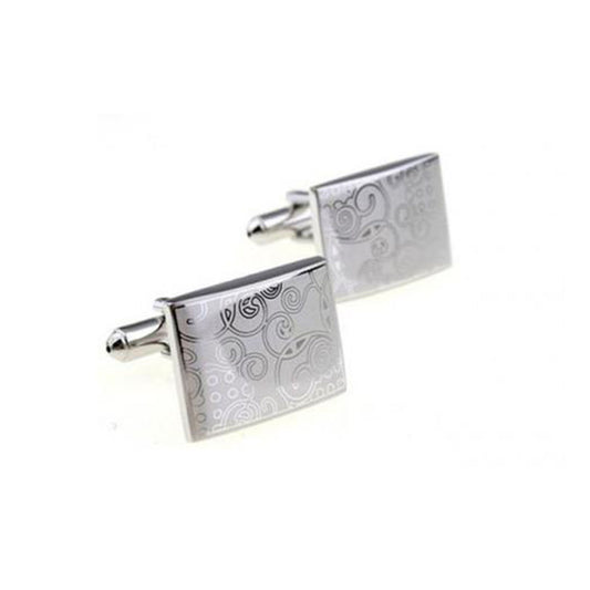Polished silver cufflinks with laser engraved koru design
